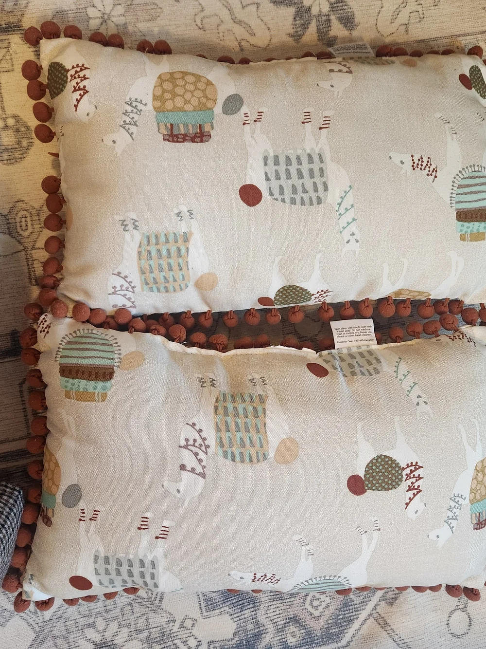 Handmade Llama Accent Pillow in Cream with Rust Pom Trim